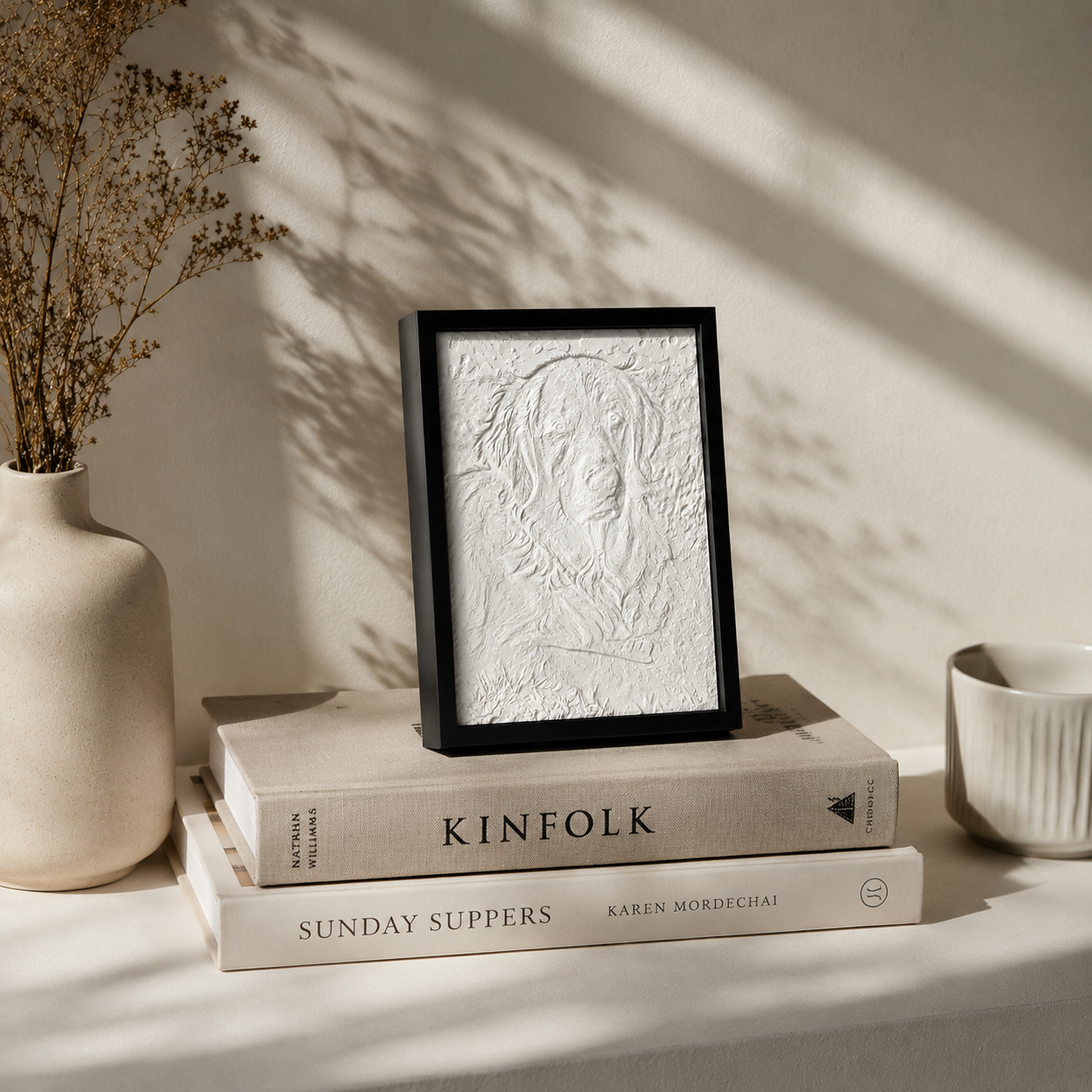 A warm-glowing color dog memorial artwork placed on a bedroom nightstand as a comforting cat or dog sympathy keepsake.